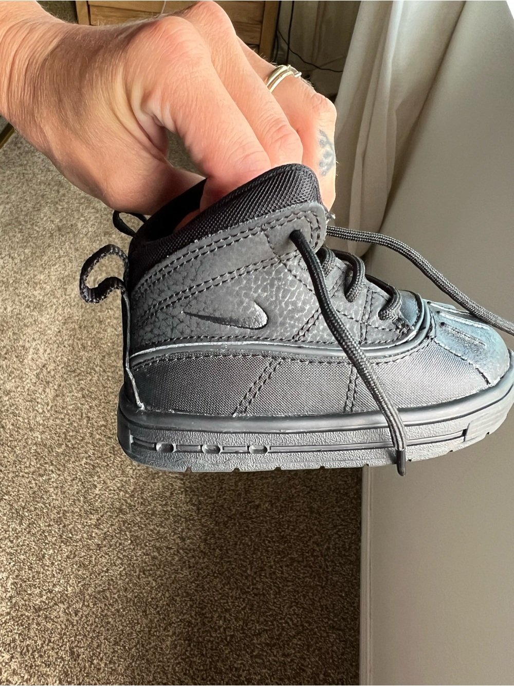 Nike Kids Black High-Top Sneaker with Subtle Texture
